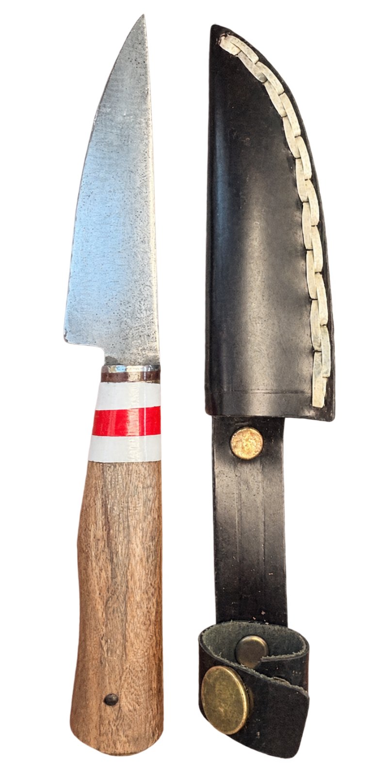cuchillo acero con detalles rojo y blanco en el mango